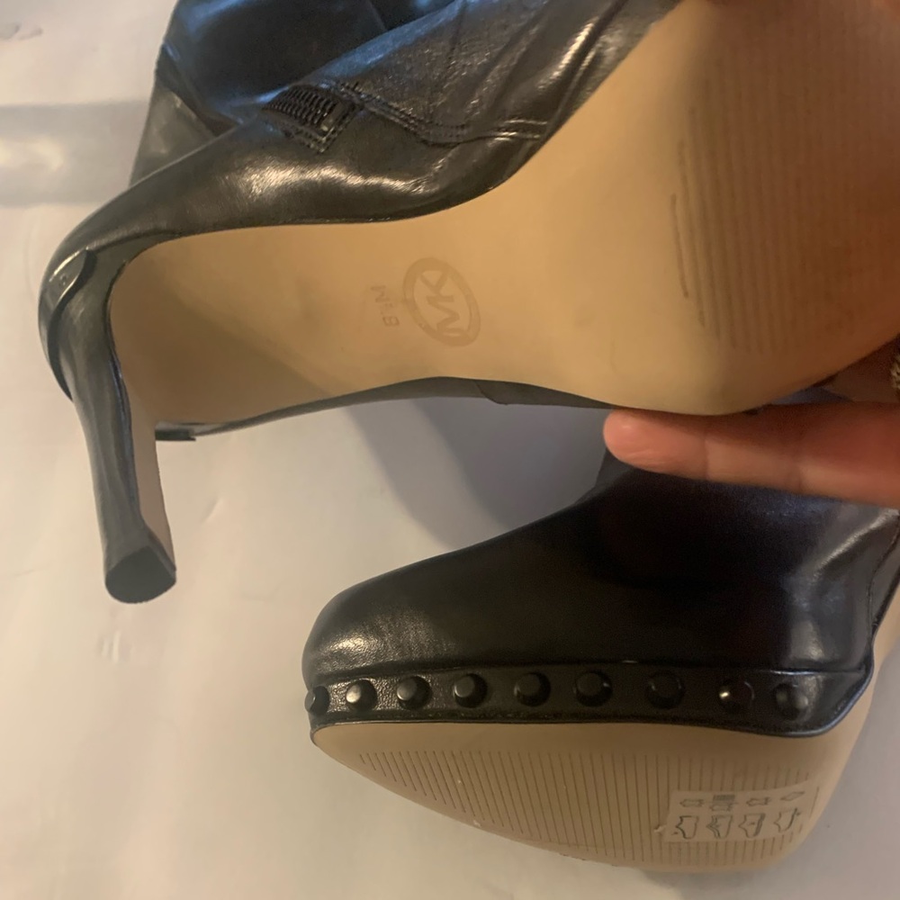 Brand new with box. Size 8.5. The heel is too big for me.
